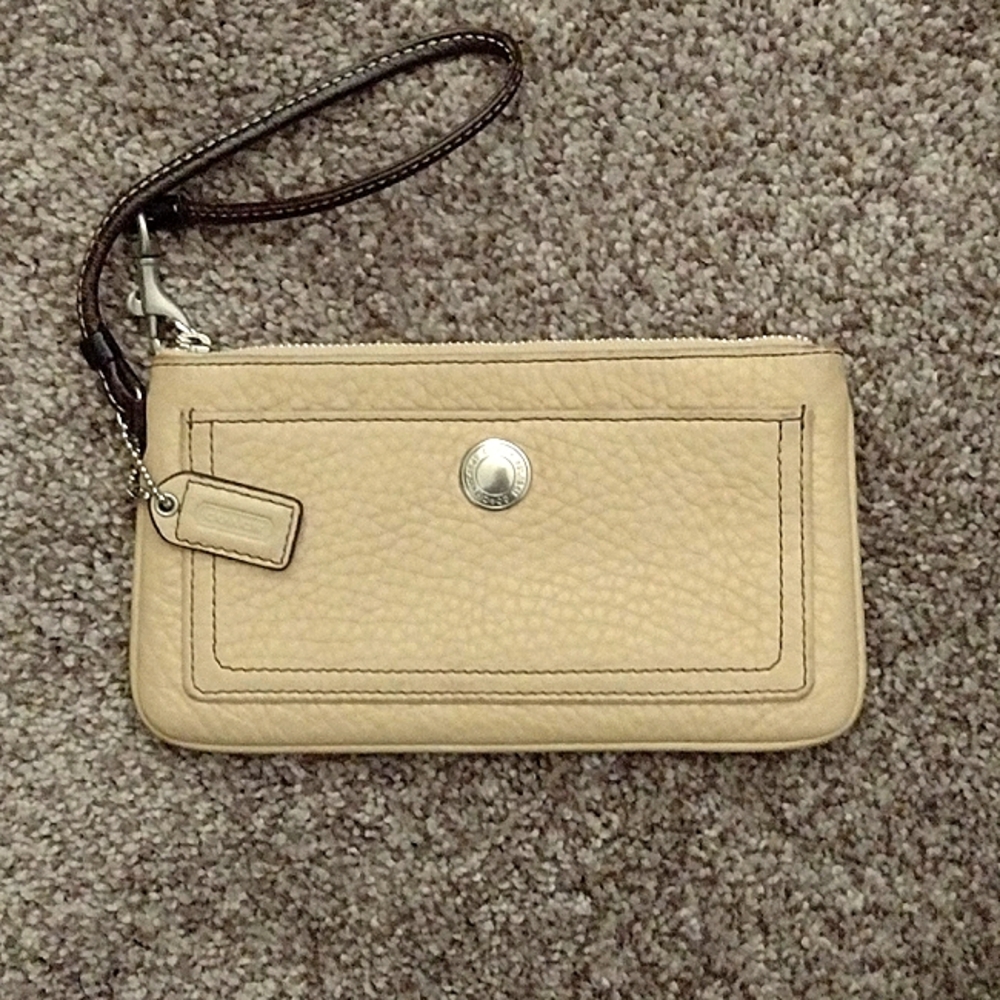 Beige pebbled leather wristlet